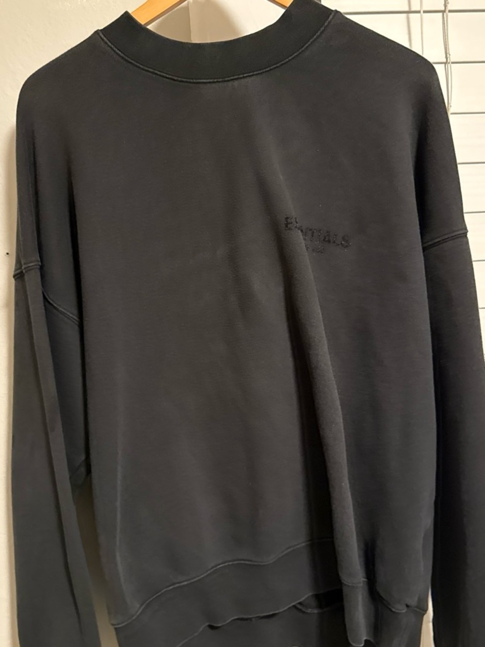 Essentials Black Men’s Crewneck Sweatshirt with Subtle Logo